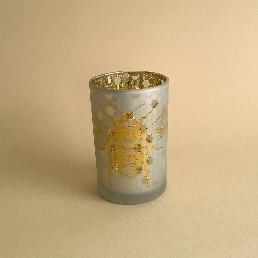 Portavelas de té con forma de abeja dorada
