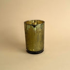 Portavelas de té con flores verdes y doradas