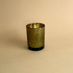 Portavelas de té con flores verdes y doradas