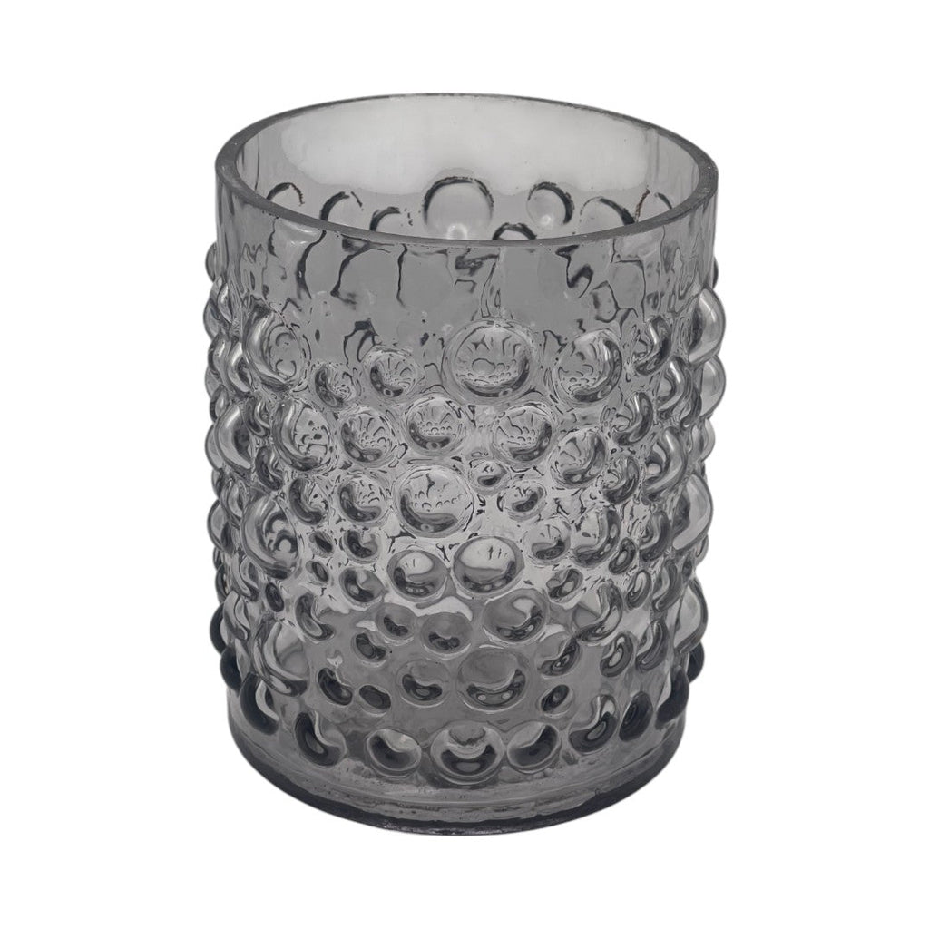Récipient en verre transparent avec motifs en relief façon bulles, parfait pour une déco moderne ou comme photophore.